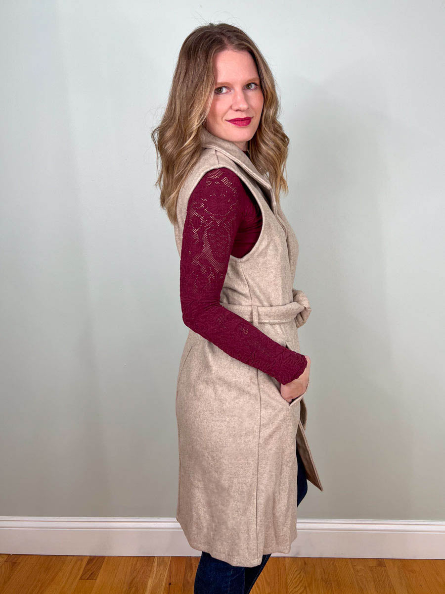 Sleeveless vest coat with belted waist